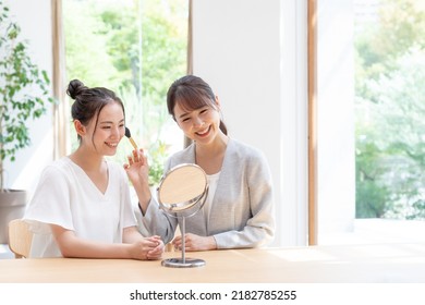 Beauty Advisor And Young Woman