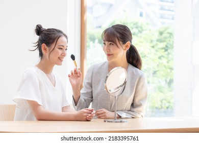 Beauty Advisor And Young Woman