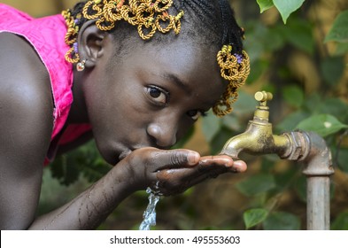 Beauty Of Africa Drinking Clean Water From A Faucet