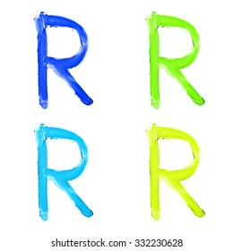 Beauty alphabet set - blue, green and yellow dye letters isolated on white background. "R" letter.