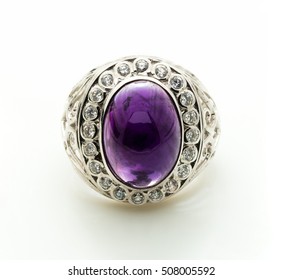 Beauty Of Amethyst Ring On White Background