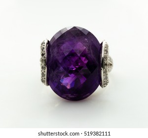 Beauty Of Amethyst Ring On White Background