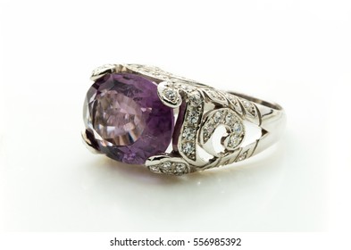 Beauty Of Amethyst Ring On White Background