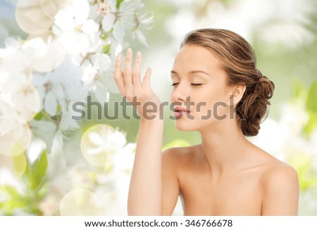 Similar – Image, Stock Photo Young woman enjoying cherry blossoms in springtime