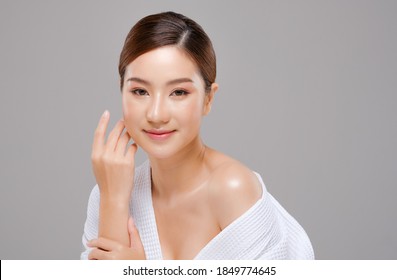 Beauty Asian Face Of The Young Beautiful Woman Skin Natural Make Up.  Close Up Face Pretty Portrait Spa And Salon In Bathing Suit Concept