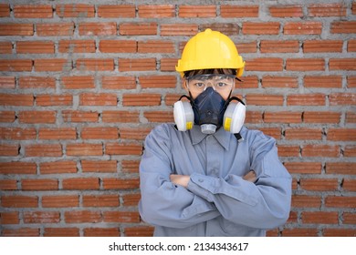 Beauty Asian Girl Construction,civil Engineer Wearing PPE Safety Helmet,Hardhat,Safety Glasses,Gas Mask.Safety Concept.Work Smart.Air Pollution Global Warming.Respiratory,lung Protection.brick Wall.