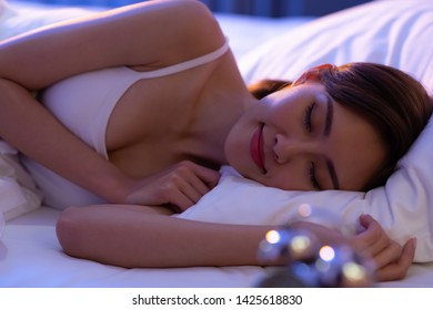 Beauty Asian Woman Has A Good Sleep On The Bed At Night