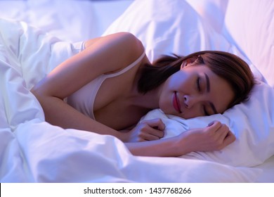 Beauty Asian Woman Has A Good Sleep On The Bed At Night