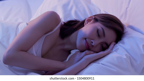 Beauty Asian Woman Has A Good Sleep On The Bed At Night