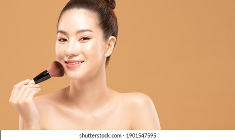 Beauty Asian Woman Hold Make Up Brush  And Cheerful With Make Up Brush