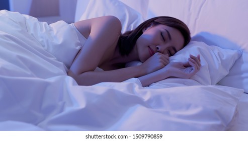 Beauty Asian Woman Sleep Well On The Bed At Night