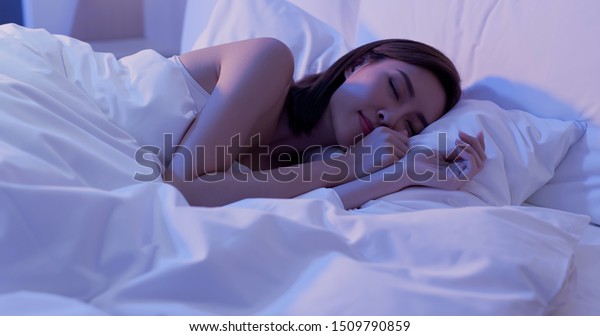 Beauty Asian Woman Sleep Well On The Bed At Night