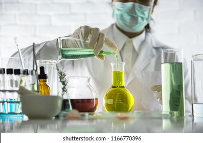 Beauty background, scientist is sampling a chemical extract from organic natural, research and develop background, Scientific concept is sample project about herbal medicine for health & beauty care.
