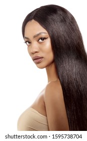 Beauty black skin woman African Ethnic female face. Young african american model with long hair