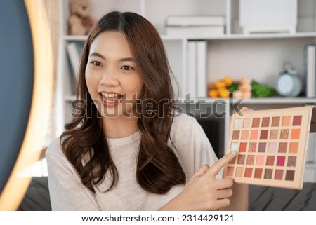 Beauty blogger, Woman teaching how to apply makeup, Recommended cosmetics, Record vlog streaming video.
