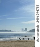 The beauty of the blue sky and rough waves of Haeundae Beach in Busan