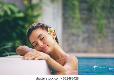 Beauty And Body Care. Sensual Young Woman Relaxing In Outdoor Spa Swimming Pool.