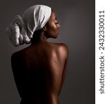 Beauty, body and heritage with natural black woman in studio on gray background for wellness. Skincare, culture or tradition and aesthetic young model in Africa for cosmetics or dermatology from back