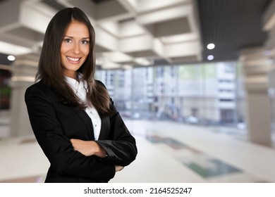 Beauty business woman in a modern startup office. - Shutterstock ID 2164525247