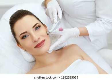 Beauty Clinic. Woman Doing Face Skin Cryo Oxygen Treatment