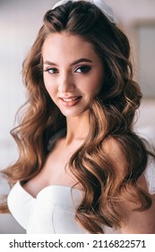 Beauty Close-up Portrait Of Happy Bride With Luxury Make-up And Hairstyle In Studio. Bridal Style