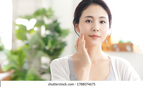 Beauty concept of an asian woman. Beauty salon. Skin care. Body care. Hair removal.