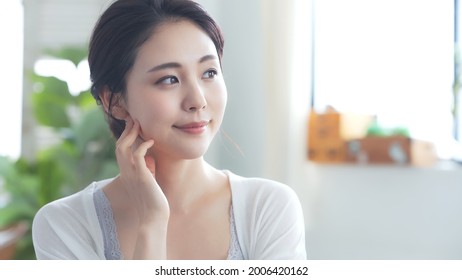 Beauty concept of an asian woman. Beauty salon. Skin care. Body care. Hair removal.