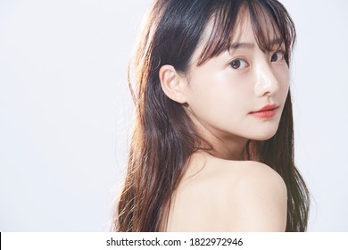 Beauty concept portrait of young Asian woman with soft highlights