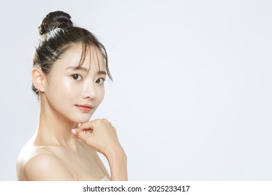 Beauty concept portrait of young Asian woman with soft highlighting
