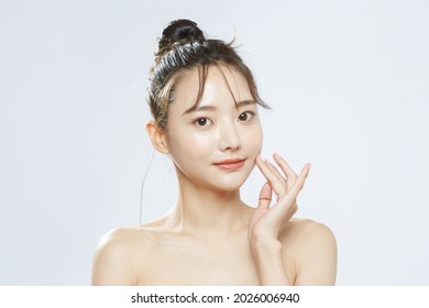 Beauty concept portrait of young Asian woman with soft highlighting