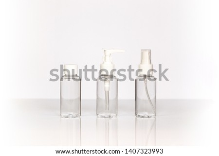 Beauty cosmetics glassbottle; branding mock up; front view on pastel white background. Package for essential oil.