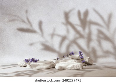 Beauty cosmetics product presentation mockup scene with copy space made with white stones and lavender flower. Composition aims to emphasize the natural purity and summer mood. Studio photography. - Powered by Shutterstock