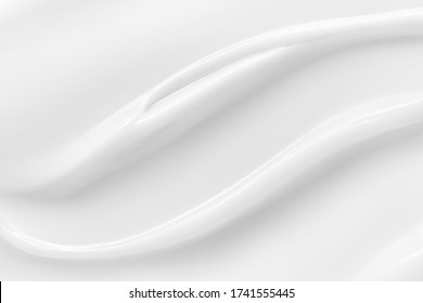 Beauty cream texture. White lotion, moisturizer, skin care cosmetic product smear background - Shutterstock ID 1741555445