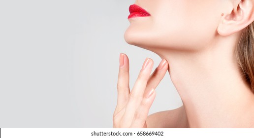 Beauty Face. Beautiful Woman Neck With Clean Skin And Red Lips 