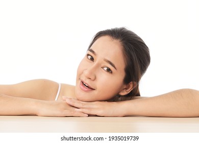 Beauty face skincare woman sitting portrait of beautiful attractive Thai Asian female model isolated on white background.