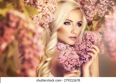 Beauty Fashion Model Girl With Lilac Flowers 