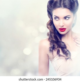 Beauty Fashion Model Retro Girl Over Blinking Background. Vintage Style Woman Portrait. Luxury Lady With Holiday Magic Background. Miracle Light. Copy Space 