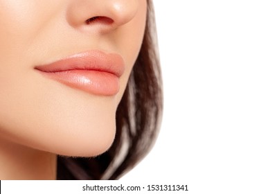 Beauty Fashion Woman Lips With Natural Makeup. Shine Lipstick. Beauty Girl Face Close Up. Closeup Mouth Nude Colors Lacquered. Sexy Lips, Make Up. White Background. Big Lips. Isolated. Face In Profile