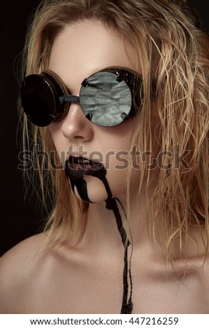 Beauty female Model with black Drips on Face