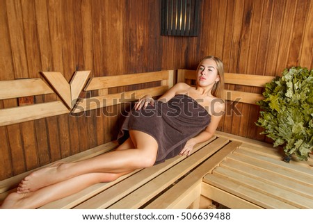 Beauty female relax in a sauna.