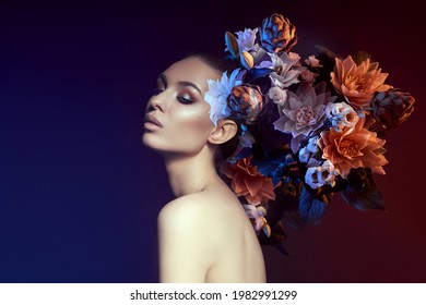 Beauty Flowers Face Of A Woman With Double Exposure. Portrait Of A Girl Neon Light And Color, Professional Makeup, Nude Back Of A Woman, Flowers In The Head