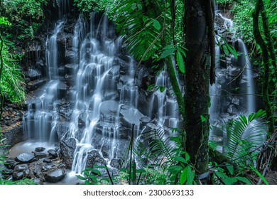 The beauty and freshness of the Kanto Lampo waterfall in the middle of the green wilderness