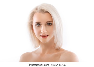 beauty gentle portrait of a beautiful young woman with white hair, with good clean skin on a white background. She smiles and looks at the camera