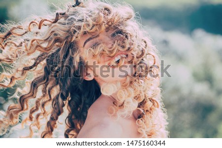 Image, Stock Photo A blonde with curly hair communicates via video link on a laptop sitting in front of a window