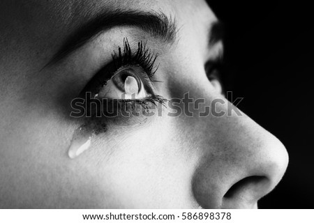 beauty girl cry on dark background monochrome black and white photo