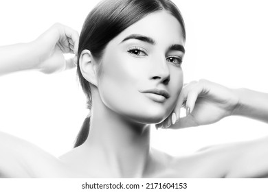 Beauty Girl Face. Clean Skin, Bright Make-up, Hand Near Head. Brunette Slick Hair Style. White Background. Skincare Facial Treatment Female Health Concept. Black And White