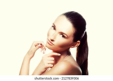 Beauty Girl Face Close-up. Cite Young Woman Brunette Hair And Beautiful Neck Studio Profile Portrait. Studio Shot. Skincare Facial Treatment Health Concept