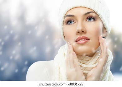 A Beauty Girl On The Winter Background