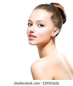 Beauty Girl. Portrait Of Beautiful Young Woman Looking At Camera. Isolated On White Background. Fresh Clean Skin