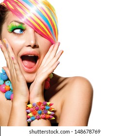 Beauty Girl Portrait with Colorful Makeup, Hair, Nail polish and Accessories. Colourful Studio Shot of Funny Surprised Woman. Vivid Colors. Open Mouth, Emotions